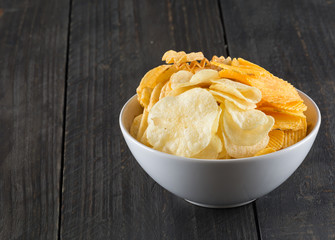 potato chips on wood background