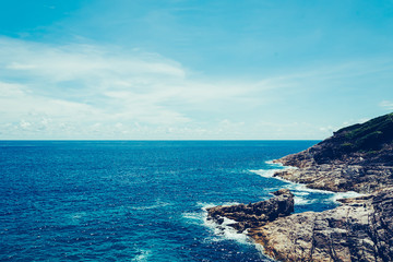 Fototapeta premium blue sky with sea and rock - film filter