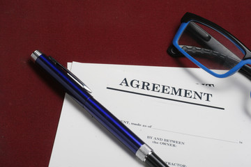 Agreement Letter at Dark Red Background