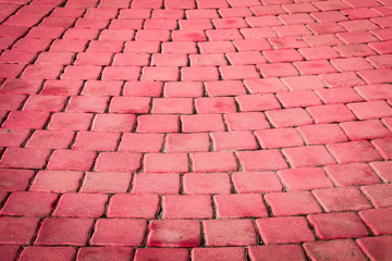 Pattern of small red brick block on walkway