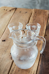 Glass pitcher of water and glass.