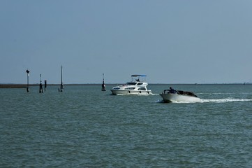 Obraz premium Two boat in venetian lagoon, Italy