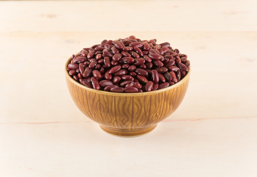 red  beans on wood background