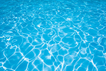 Fototapeta na wymiar Clean and bright water surface in swimming pool