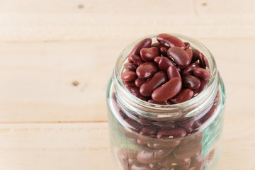 red beans on wood background