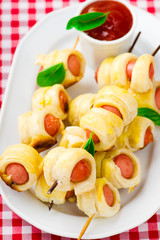 sausage rolls on skewers