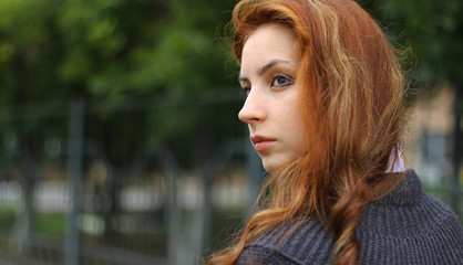 red-haired girl in autumn jacket