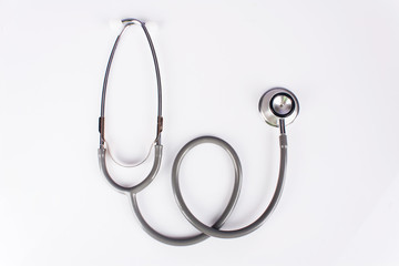 gray stethoscope on white background