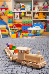 wooden train in the play room