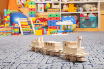 wooden train in the play room