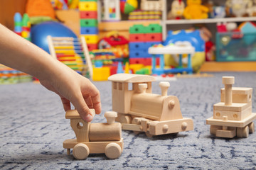 wooden train in the play room