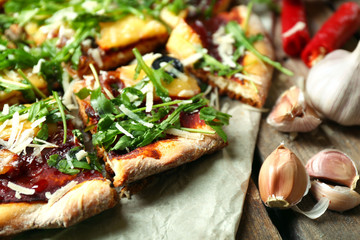 Tasty pizza with vegetables on table close up