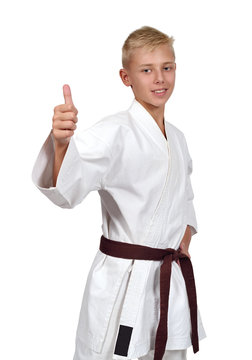 karate boy showing thumb up