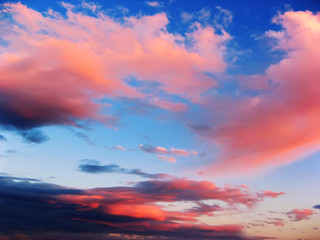 Purple and pink clouds in the sky at sunset