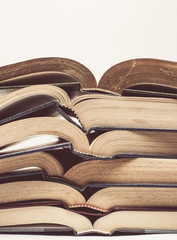 Vintage tone of Composition with stack of books on white backgro