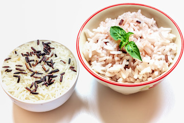 selective focus brown rice,leaf in bowl and rice seed in bowl on