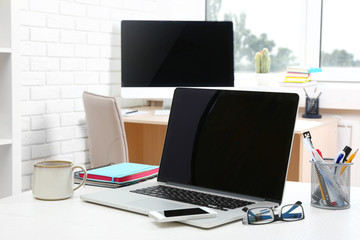 Workplace with computer in office