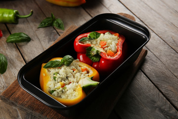 Stuffed peppers with vegetables on table close up