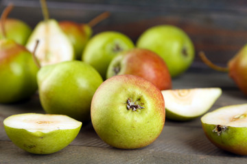 Ripe tasty pears on table close up