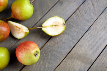 Ripe tasty pears on table close up