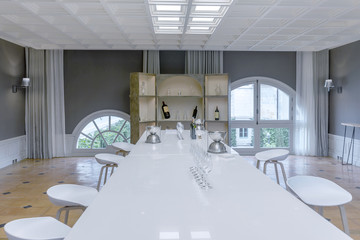 Fototapeta na wymiar long and white dining table