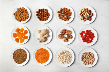 Set of different products on wooden background