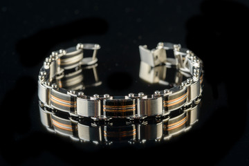 Fototapeta na wymiar jewelry and bracelets on a black background 