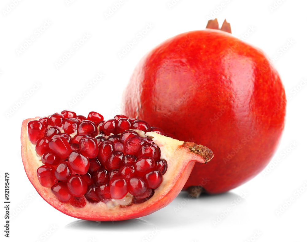 Wall mural juicy pomegranate isolated on white