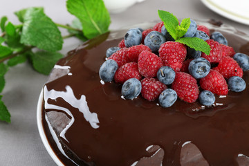 Delicious chocolate cake with summer berries, closeup