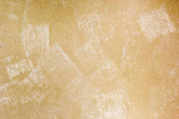 beige wall painted with textured paint roller