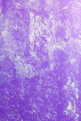 lilac wall painted with textured paint roller