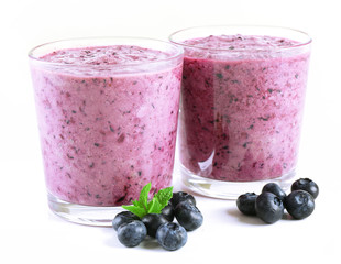 Glasses of blueberry smoothie, closeup