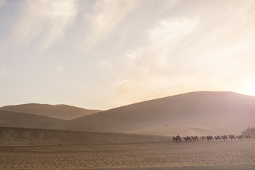 Fototapeta na wymiar Sand dunes in the desert taken in Mingsha Shan, Dunhuang, Gansu