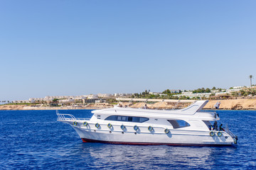 Fototapeta na wymiar Luxury cabin cruiser cruising offshore
