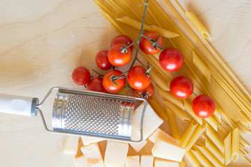Grana padano with pasta and tomatoes