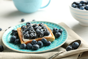 Still life with gourmet fresh blueberry tart