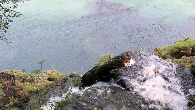mountain water stream falling in river