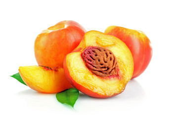 Fresh peaches isolated on white
