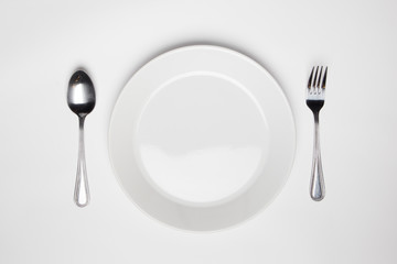 fork and spoon and empty plate