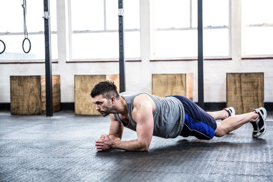 Fit man working out in plank