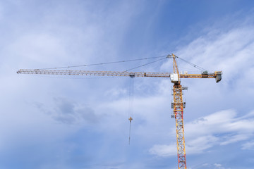 Highrise building and huge crane