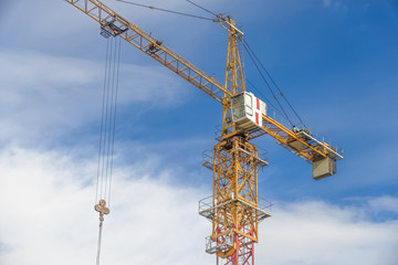 Multistorey housing under construction and construction cranes