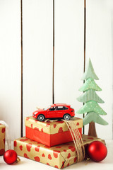 Christmas gifts on wooden background