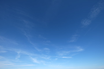 A clear sky with little clouds