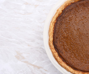 Homemade pumpkin pie with copy space