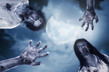 Two scary zombie with full moon background
