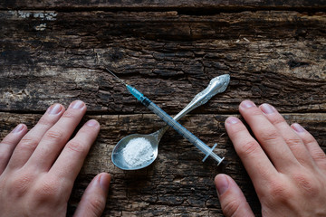 Premium Photo  Cocain drug syringe spoon