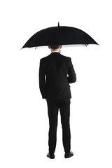 Back view business man standing holding umbrella