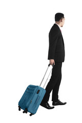 Back view of business man walking with suitcase