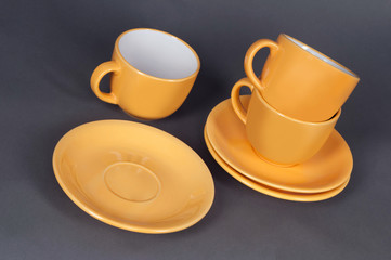 Obraz na płótnie Canvas orange cup and saucer